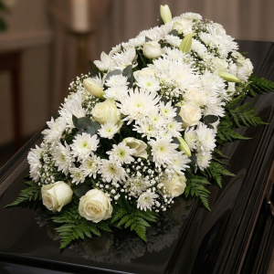 coffin spray funeral flowers - medium white arrangement